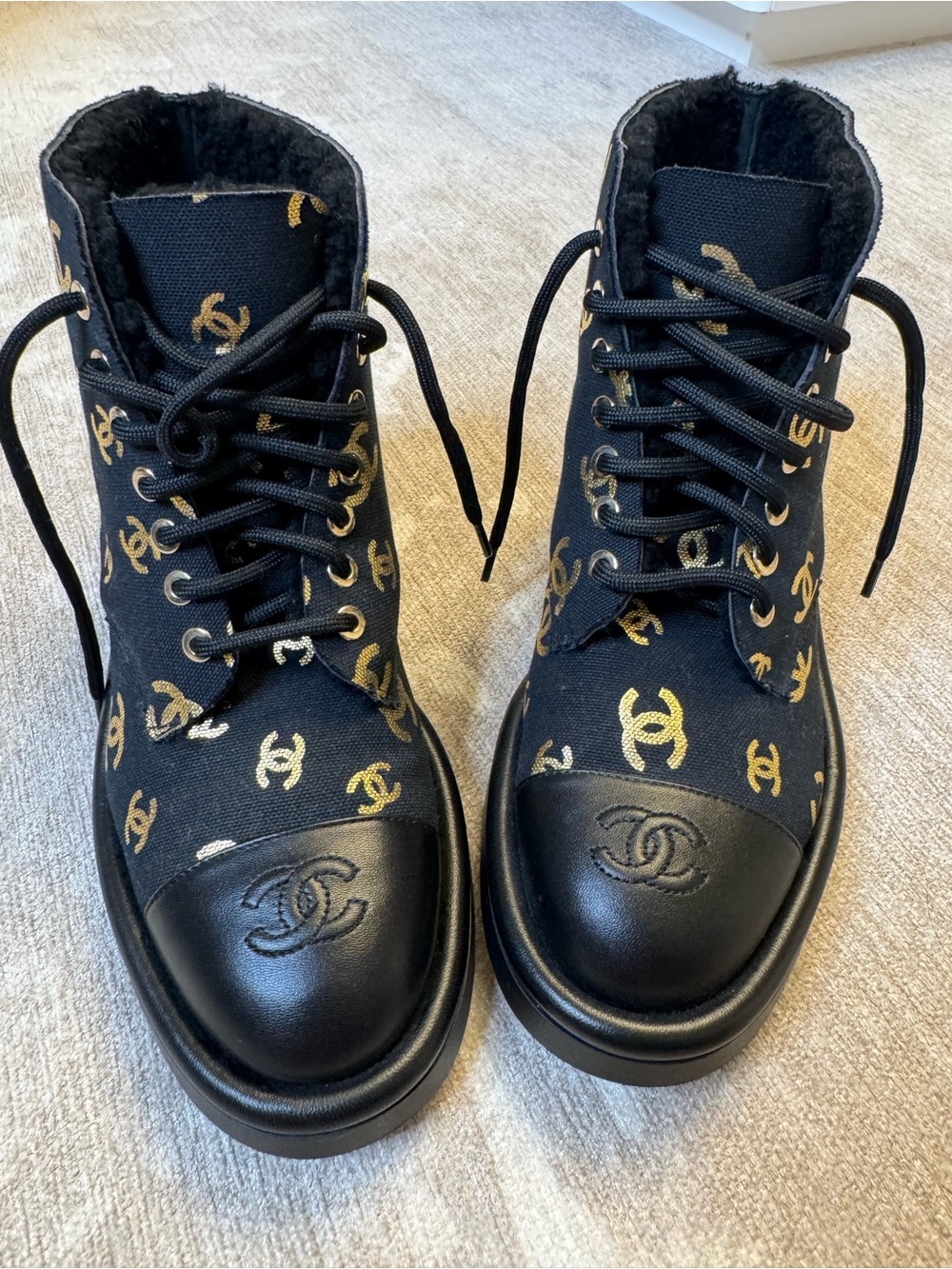 CHANEL Black and Gold CC Logo Lace-Up Combat Boots